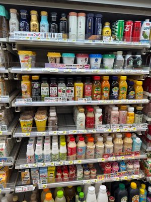 Shelves of drinks at a convenience store abroad